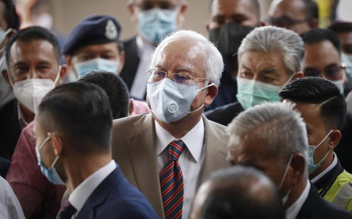 Najib Razak gets 12 years in jail for 1MDB-linked graft case